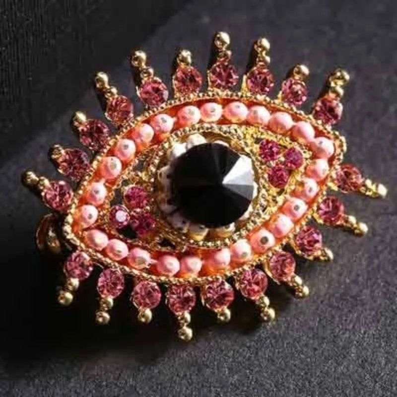 Devilish Sparkle Brooches: Luxe for All Occasions
