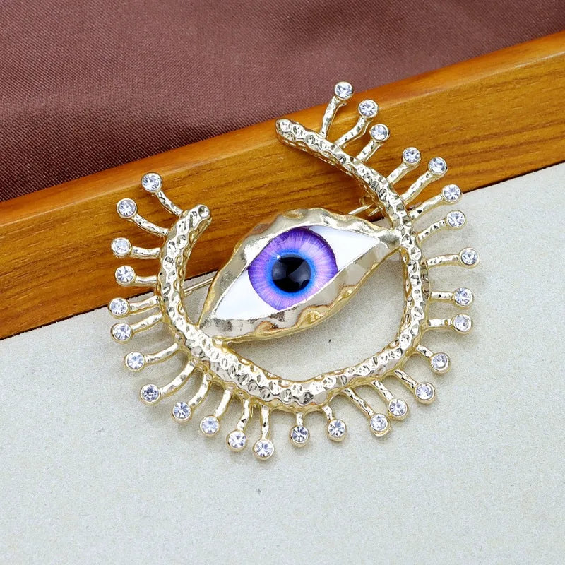 Devilish Sparkle Brooches: Luxe for All Occasions