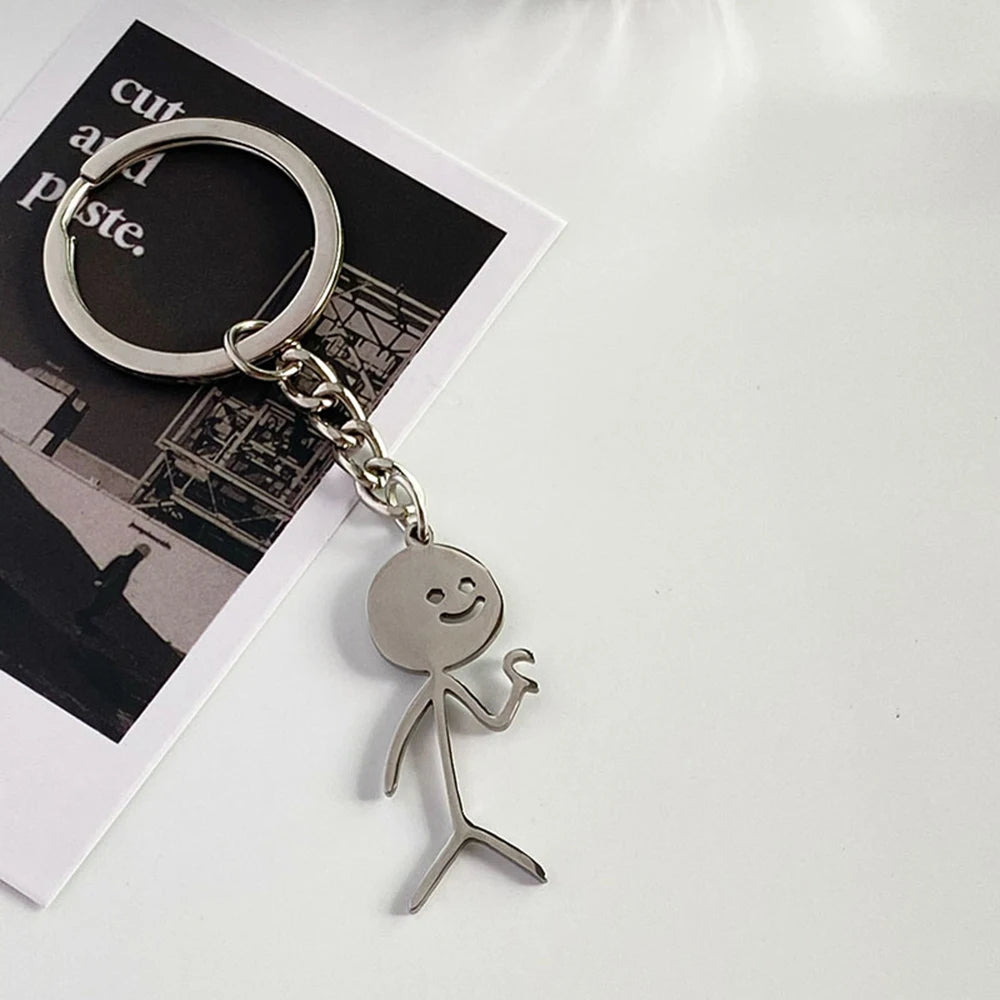 Porte-clés Humoristique Cœur et Doigt en Acier