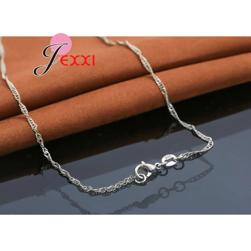 Ensemble de bijoux en argent : boucles d'oreilles et collier El - Zone shopping